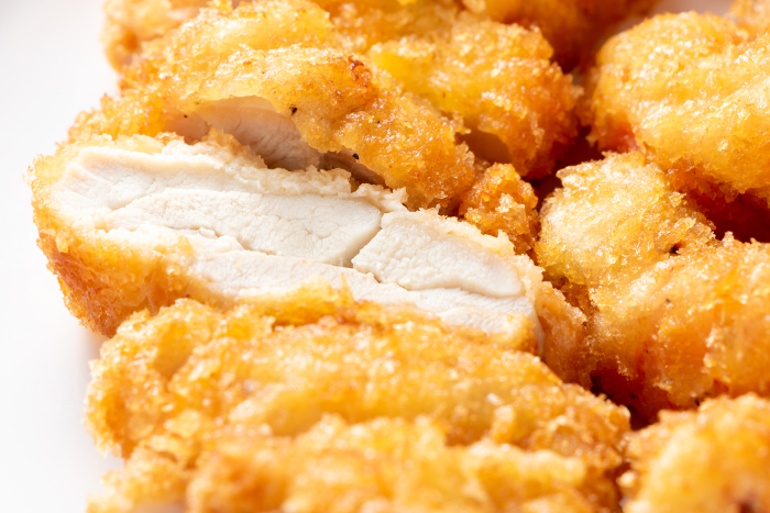 Close-up of chicken cutlet.
