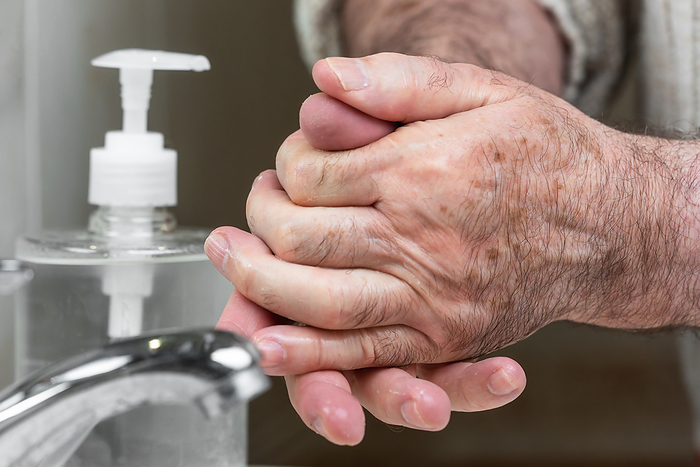 Elderly people ,using alcohol antiseptic gel ,prevent infection,outbreak of Covid 19. Senior man washing hand with hand sanitizer to avoid contaminating with Coronavirus. Elderly People, Using Alcohol Antiseptic Gel, Prevent Infection, Outbreak of Covid 19. Senior Man Washing Hand with Hand Sanitzer to Avoid Contaminating with Coronavirus., by Zoonar DAVID HERRAEZ