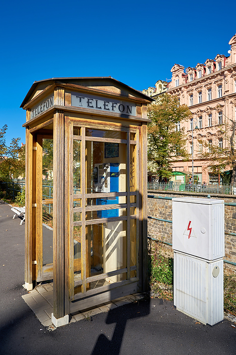 old telephone box in the old town of Karlovy Vary in the Czech Republic Old Telephone Box in the Old Town of Karlovy Vary in the Czech Republic, by Zoonar Heiko Kueverl