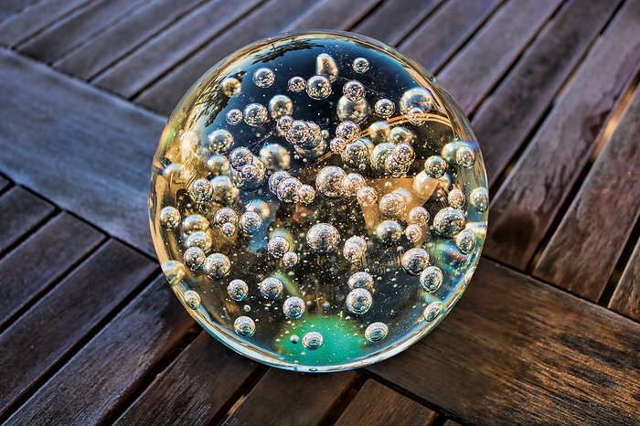 Old glass ball on a wooden table Old Glass Ball on a Wooden Table, by Zoonar ArTo
