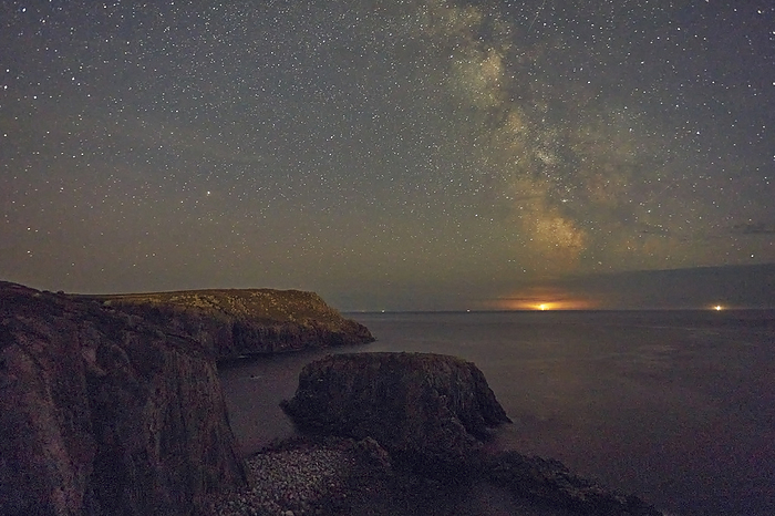 An autumn view of the Milky Way over the Atlantic Ocean, seen from the cliffs of Land s End, Cornwall, the most southwesterly point of Great Britain. An autumn view of the Milky Way over the Atlantic Ocean, seen from the cliffs of Land s End, the most southwesterly point of Great Britain, Cornwall, England, United Kingdom, Europe, by Nigel Hicks