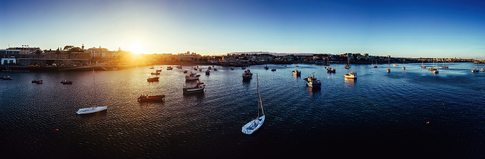 Aerial drone panoramic view of sunset at Cascais Bay, in the Lisbon region of the Portuguese Riveira, Europe Aerial drone panoramic view of sunset at Cascais Bay, in the Lisbon region of the Portuguese Riveira, Europe, by Alexandre Rotenberg