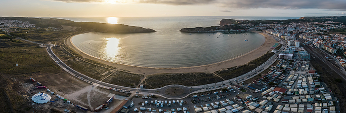 Aerial drone panoramic view at sunset of Sao Martinho do Porto bay, Portugal shaped like a scallop with calm waters and fine white sand Aerial drone panoramic view at sunset of Sao Martinho do Porto bay, shaped like a scallop with calm waters and fine white sand, Oeste, Portugal, Europe, by Alexandre Rotenberg