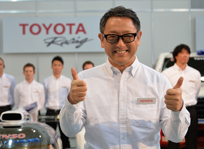 Motorsports Activities Toyota Announces Plans for 2014 January 30, 2014, Tokyo, Japan   President Akio Toyoda of Japan s Toyota Motor Corp., flashes the thumbs up sign during a presentation of its motor sports activities for 2014 in Tokyo on Thursday, January 30, 2014. They will include participation in the FIA World Endurance Championship and the Le Mans 24 hour race, the NASCAR racing series and the Super GT and Super Formula championships. Toyoda said its motor sports activities through Lexus Racing and Toyota Racing are aimed to bring more joy to more people through automobiles.   Photo by Natsuki Sakai AFLO  AYF  mis 