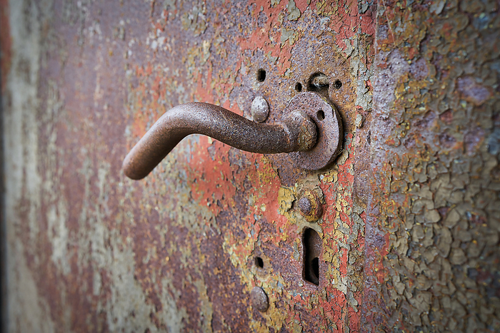 Door handle on an old metal door in the port of Magdeburg Door Handle on an Old Metal Door in the Port of Magdeburg, by Zoonar HEIKO KUEVERL