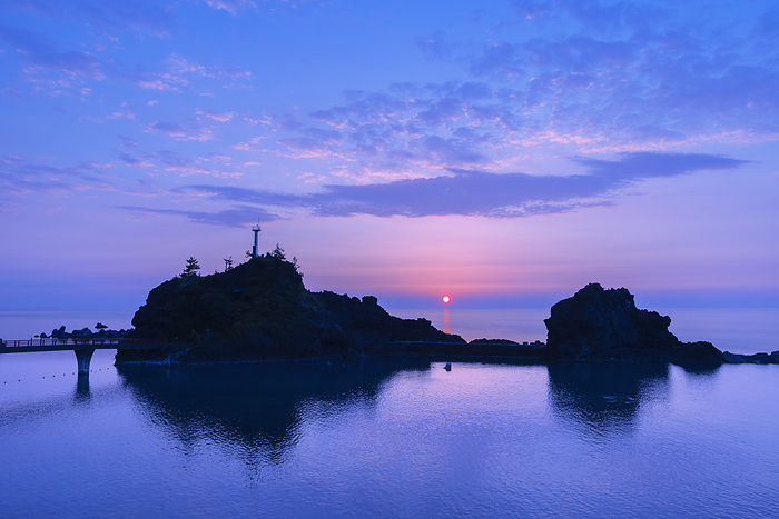 Benten Iwa and sunset in Nose, Niigata Prefecture