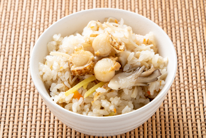Rice cooked with baby scallops and mushrooms.