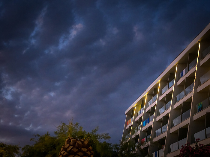 Dark evening clouds at the front of a residential building Dark Evening Clouds at the Front of a Residential Building, by Zoonar Ewald Fr