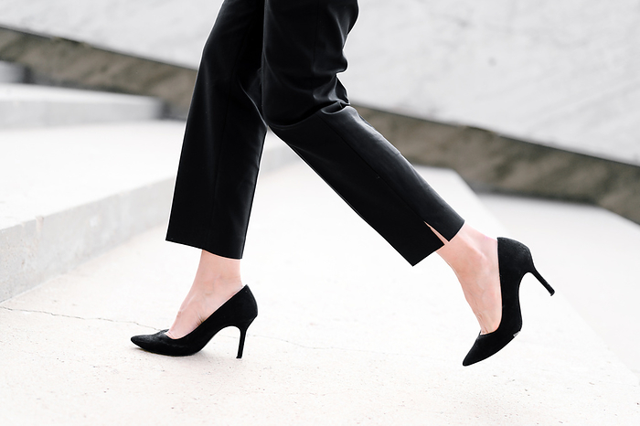 Businesswoman wearing heels climbing the Stairs in the city. Slow motion Close up on legs. Businesswoman Wearing Heels Climbing the Stairs in the City. Slow Motion Close Up on Legs., by Zoonar DAVID HERRAEZ