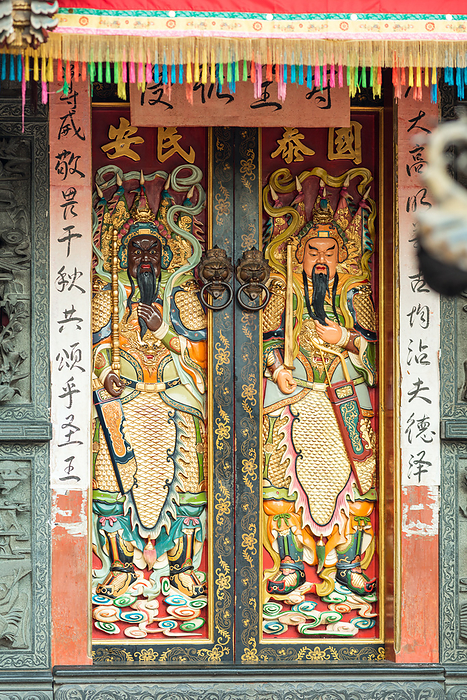 Entrance door of Hong San Si Temple in Chinatown of Kuching decorated with Chinese figures Entrance Door of Hong San Si Temple in Chinatown of Kuching Decorated with Chinese Figures, by Zoonar Stefan Laws