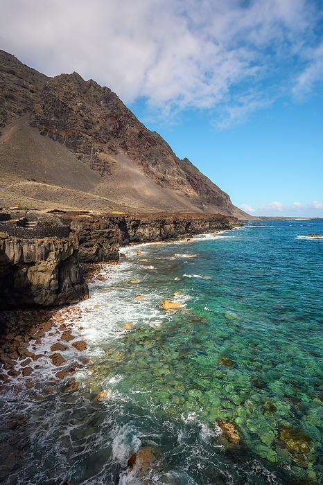 Lava coast in El Hierro island, Canary Islands, Spain. El Golfo, biosphere reserve. Lava Coast in El Hierro Island, Canary Islands, Spain. El Golfo, Biosphere Reserve., by Zoonar DAVID HERRAEZ