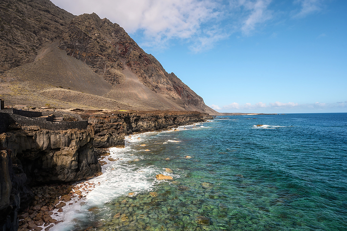Lava coast in El Hierro island, Canary Islands, Spain. El Golfo, biosphere reserve. Lava Coast in El Hierro Island, Canary Islands, Spain. El Golfo, Biosphere Reserve., by Zoonar DAVID HERRAEZ