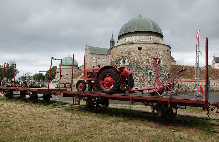 Old tractor at Vadstena Castle Old Tractor at Vadstena Castle, by Zoonar Volker Rauch