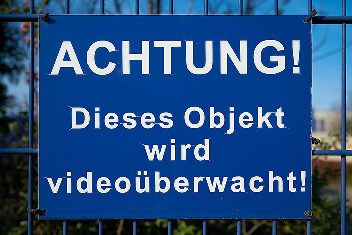 blue sign with the inscription  Blue Sign With The Inscription Attention, This Object Is Under Video Surveillance, by Zoonar Heiko Kueverl