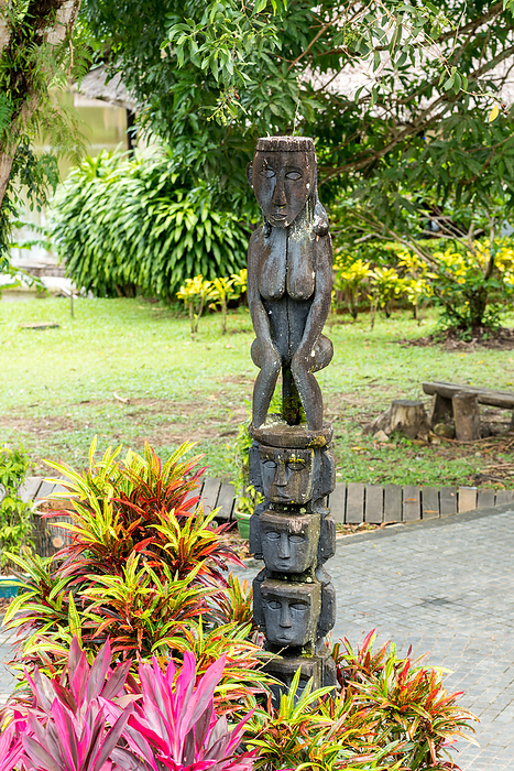 Totem with carving figures in the Sarawak Cultural Village Totem with carving figures in the Sarawak Cultural Village, by Zoonar Stefan Laws