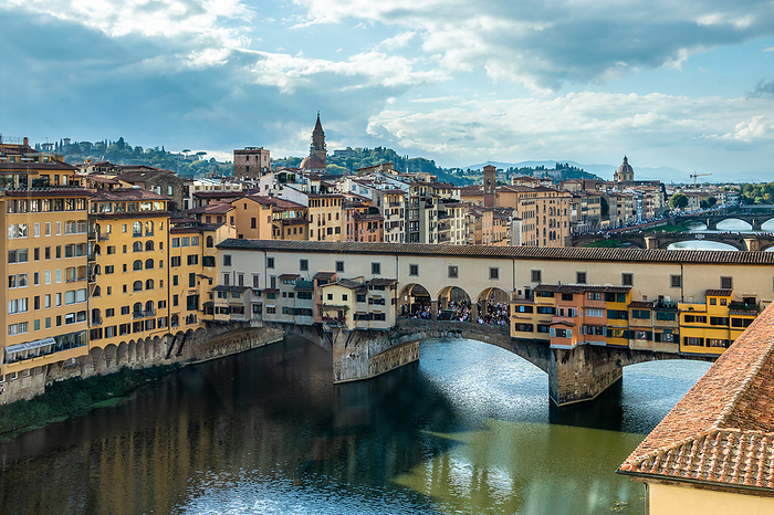 FLORENCE, TUSCANY ITALY   OCTOBER 19 : View of buildings along and across the River Arno in Florence  on October 19, 2019. Unidentified people. Florence, Tuscany Italy   October 19: View of Buildings Along and Across the River Arno in Florence on October 19, 2019. Unidetified People., by Zoonar Phil Bird
