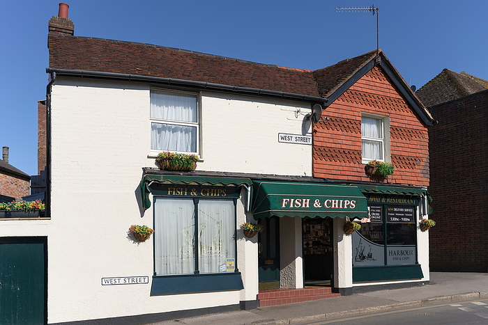 EAST GRINSTEAD, WEST SUSSEX, UK   MARCH 9 : Fish and chip shop closed because of the lockdown due to coronavirus in East Grinstead on March 9, 202 East Grinstead, West Sussex, UK   March 9: Fish and Chip Shop Closed Because of the Lockdown Due to Coronavirus in East Grinstead on March 9, 202, by Zoonar Phil Bird