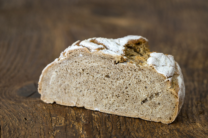 Rye bread on dark wood Rye Bread on Dark Wood, by Zoonar Bernd Juergen