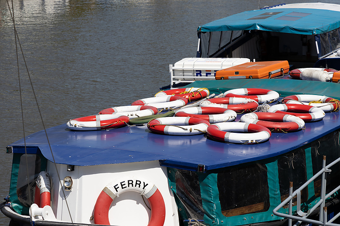 BRISTOL, UK   MAY 14 : Lifebuoys on the roof of the ferry  on the River Avon in Bristol on May 14, 2019 Bristol, UK   May 14: Lifebuys on the Roof of the Ferry on the River Avon in Bristol on May 14, 2019, by Zoonar Phil Bird