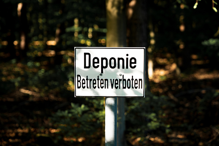 Sign: Deponie Betreten verboten  German for: Landfill, do not enter  Sign: Enter landfill for prohibited  German for: Landfill, do not Enter , by Zoonar Bernd Bruegge