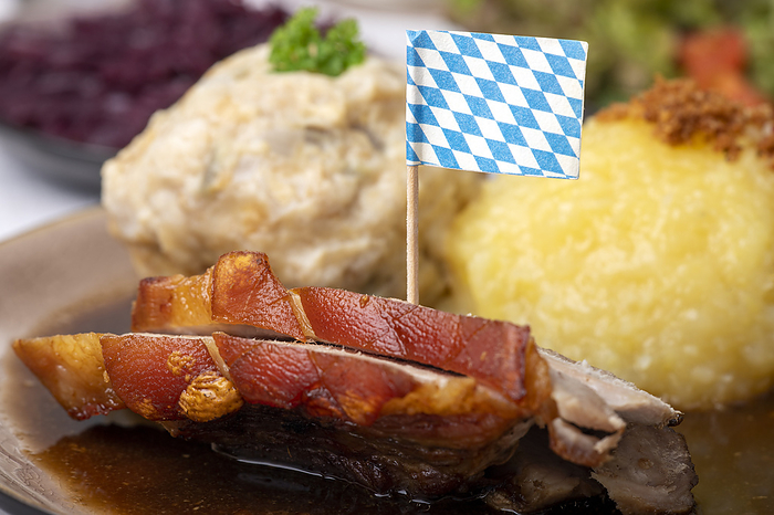 Bavarian roast pork with various dumplings Bavarian Roast Pork with Various Dumplings, by Zoonar Bernd Juergen