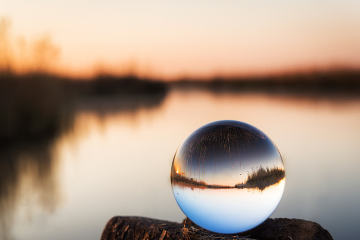 Lensball sunrise at lake Neusiedlersee in Burgenland Lensball Sunrise at Lake Neusiedlersee in Burgenland, by Zoonar Ewald Fr
