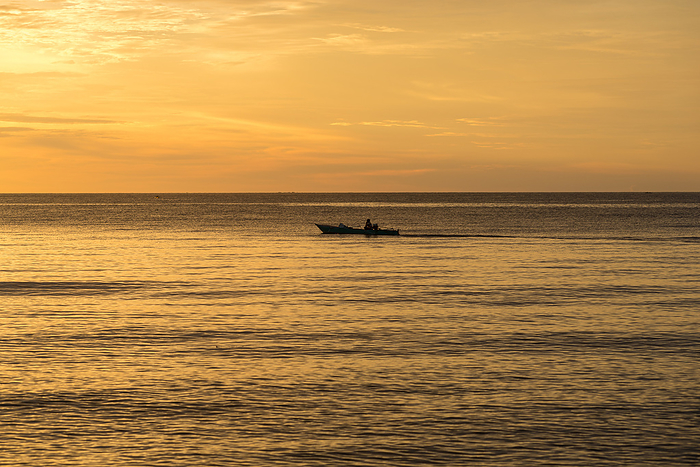 Fishing boat at sunset on Sulawesi Fishing Boat at Sunset on Sulawesi, by Zoonar Stefan Laws