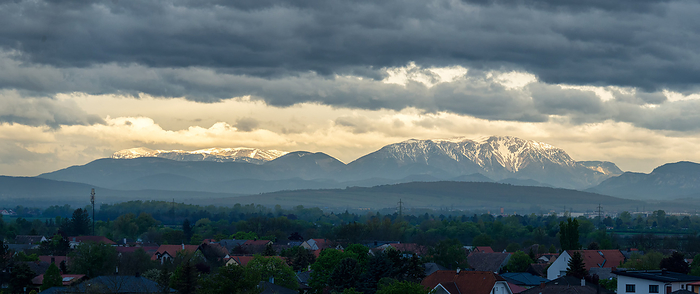Mountains Rax and Schneeberg in Lower Austria covered in snow and dark clouds in the morning Mountains Rax and Schneeberg in Lower Austria Covered in Snow and Dark Clouds in the Morning, by Zoonar Ewald Fr