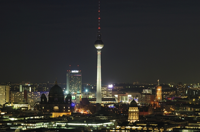 Berlin Tower, Germany Panorama of the nighttime skyline of Berlin with Fernsehturm television tower, Berlin and French Cathedrals, Park Inn Hotel and Rotes Rathaus town hall Berlin, Germany, Europe  Keyword: above and angle architecture at atmosphere Berlin building buildings capital capitals Cathedrals cities city city scapes city scapes cityscape cityscapes elevated Europe European evening exterior exteriors Federal Fernsehturm French FRG from German Germany hall high angle Hotel illuminated illumination illuminations Inn lighting lit mood night night time nights nighttime nobody of outdoor overlook overview Panorama panoramic park perspective perspectives photo photographs photos Rathaus Republic Rotes scape scapes shot shots skyline telecommunications telecommunications television the time top topview topviews tower towers towns TV up view views with