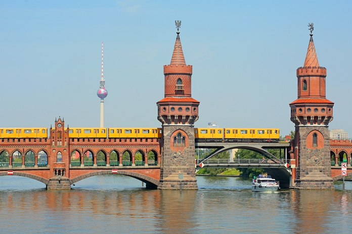 Berlin Tower, Germany Subway on the Oberbaumbruecke bridge crossing the Spree River, Fernsehturm, Television Tower, Berlin, Germany, Europe  Keyword: arch arched architecture Berlin bodies body bridge bridges building buildings commute commuters crossing day daylight daytime during Europe European exterior exteriors Federal Fernsehturm FRG Germany Germany local nobody Oberbaumbruecke of on outdoor photo photos public rail railroad railroads railway railways Republic River rivers ship ships shot shots Spree stone stony Subway subway telecommunication telecommunications Television television the tower tower towers traffic train trains transport tube TV underground viaduct viaducts view views water waters
