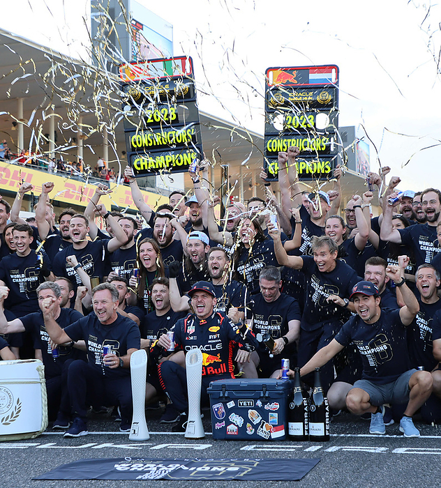2023 F1 Japan GP Final Red Bull drivers Max Verstappen  center , Christian Horner  second from left , and Sergio Perez  right  celebrate after winning the Constructors  Championship at the Suzuka Circuit on September 24, 2023.