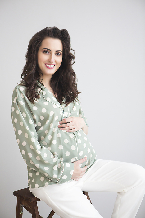 Portrait of the young smiling pregnant woman