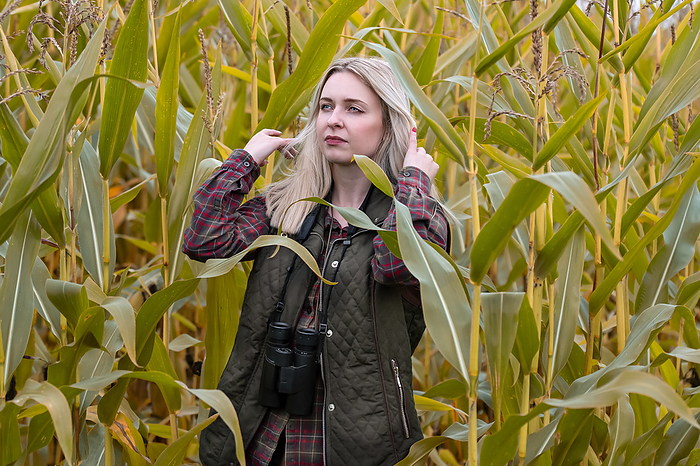 young blond girl in cornfield young blond girl in cornfield, by Zoonar Christiane We