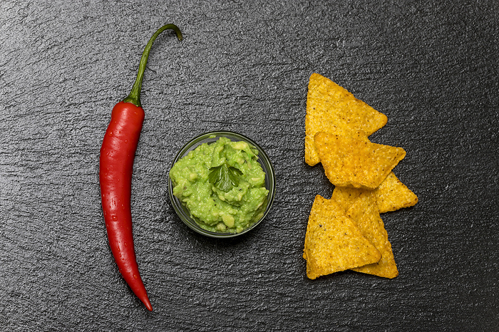 small portion of guacamole on slate small portion of guacamole on slate, by Zoonar Bernd Juergen
