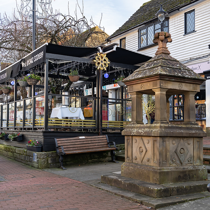 EAST GRINSTEAD,  WEST SUSSEX, UK   DECEMBER 9: View of the drinking fountain in East Grinstead West Sussex on December 9, 2021. One unidentified person EAST GRINSTEAD,  WEST SUSSEX, UK   DECEMBER 9: View of the drinking fountain in East Grinstead West Sussex on December 9, 2021. One unidentified person, by Zoonar Phil Bird
