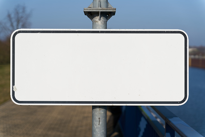 blank white sign with text space on a pillar blank white sign with text space on a pillar, by Zoonar HEIKO KUEVERL