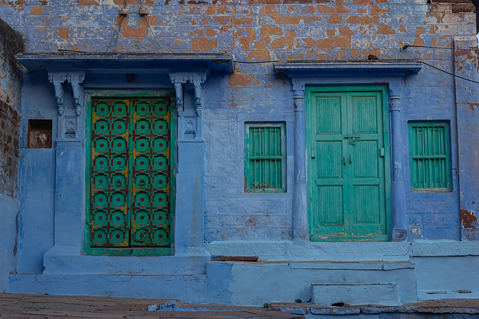 Blue white washed walls and painted doors of old house of jodhpur city, jodhpur, Rajasthan, India. Blue white washed walls and painted doors of old house of jodhpur city, jodhpur, Rajasthan, India., by Zoonar RealityImages