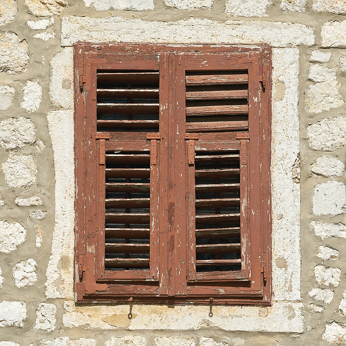 Window with shutter in the historical old town of Krk in Croatia Window with shutter in the historical old town of Krk in Croatia, by Zoonar Heiko Kueverl