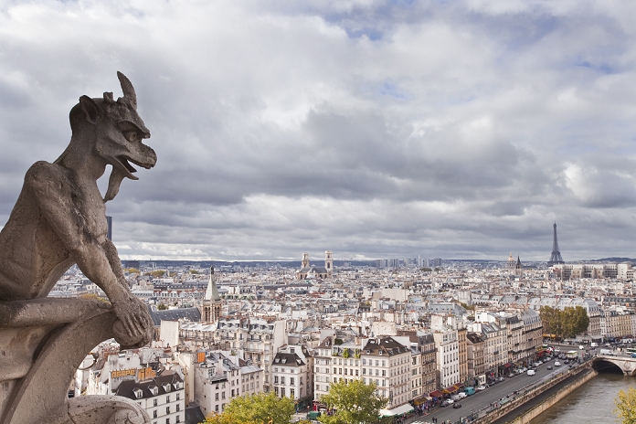France A gargoyle on Notre Dame de Paris cathedral keeping a watchful eye over the city below, Paris, France, Europe Please note that the view may have changed due to the fire.