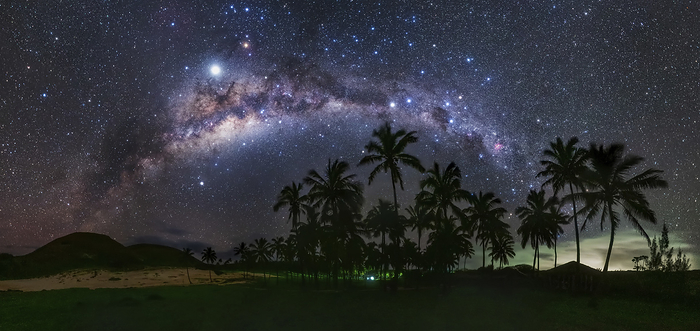 Milky Way over Easter Island Arc of the Milky Way over Easter Island. The Southern Cross, a constellation centred on four bright stars in a cross shape, can be seen at upper centre. Photographed on 26 June 2019., by JEFF DAI   SCIENCE PHOTO LIBRARY