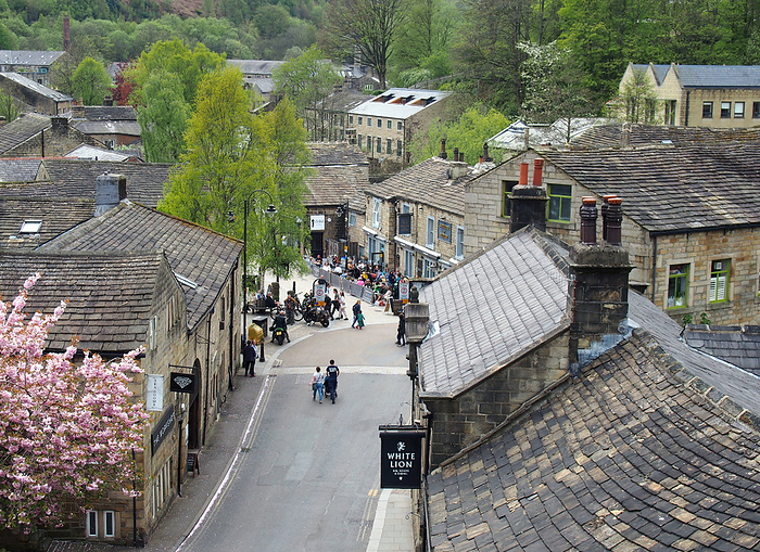 panoramic view of the town of hebden bridge with people outside pubs and bars in the town square panoramic view of the town of hebden bridge with people outside pubs and bars in the town square, by Zoonar PHILIP_OPENSH