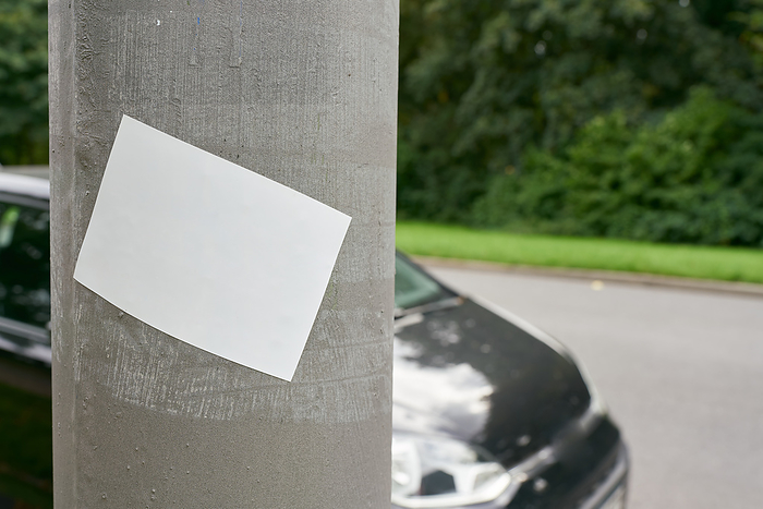 blank white sticker with space for text on roadside pillar blank white sticker with space for text on roadside pillar, by Zoonar HEIKO KUEVERL