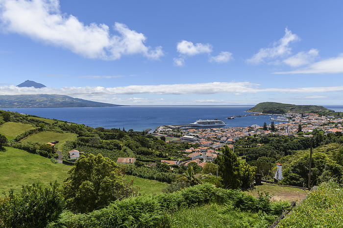View over the town of Horta on the island of Faial, a cruise ship is moored in the harbor, on the ho View over the town of Horta on the island of Faial, a cruise ship is moored in the harbor, on the ho, by Zoonar Uwe Bauch