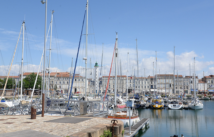 Marina and lighthouse in La Rochelle Marina and lighthouse in La Rochelle, by Zoonar Volker Rauch