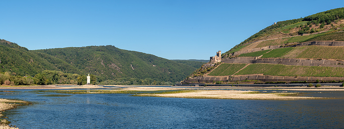Drought in Germany, low water on Rhine river close to Bingen, Germany Drought in Germany, low water on Rhine river close to Bingen, Germany, by Zoonar Alexander Lud