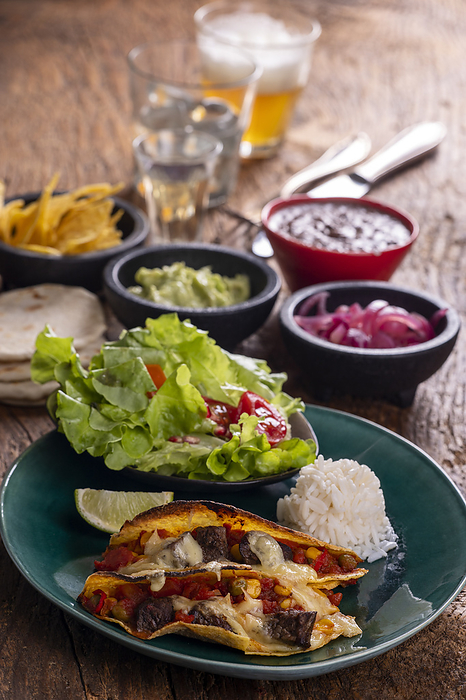 Mexican tacos on dark wood Mexican tacos on dark wood, by Zoonar Bernd Juergen