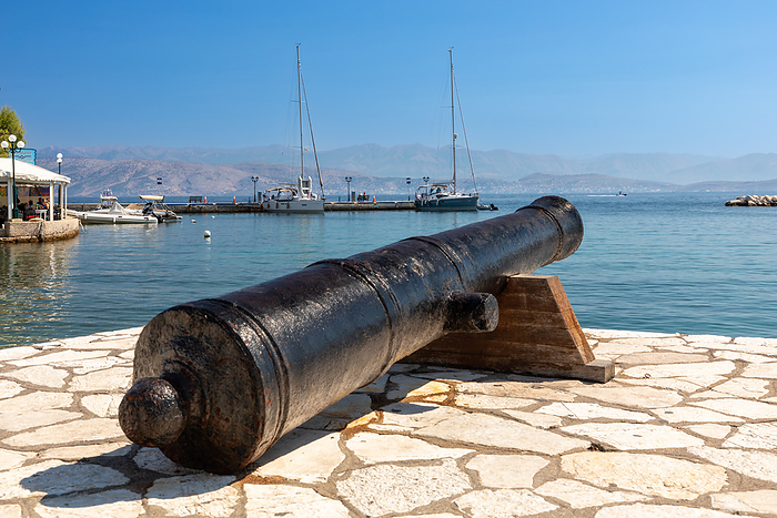 Cannon in port of Kassiopi, Corfu, Greece Cannon in port of Kassiopi, Corfu, Greece, by Zoonar ROBERT JANK