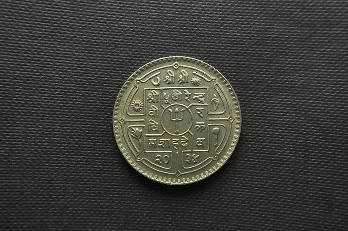 1 Rupee coin, Nepal, Back view, Silver 1 Rupee coin, Nepal, Back view, Silver, by Zoonar RealityImages