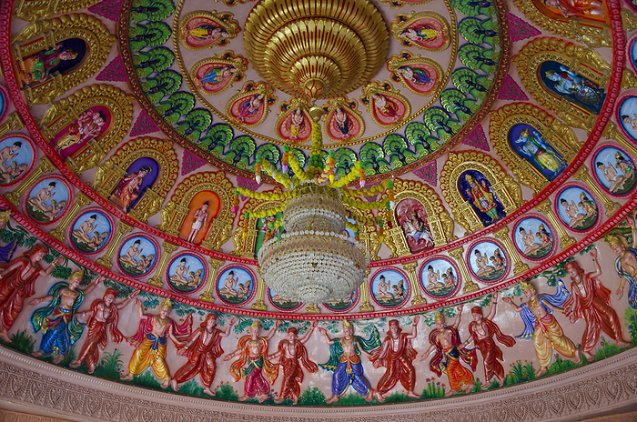 Interior ceiling of Swaminarayan temple with gods, deities and dancing figures carved on the same. Nilkanthdham, Poicha, Gujarat, India Interior ceiling of Swaminarayan temple with gods, deities and dancing figures carved on the same. Nilkanthdham, Poicha, Gujarat, India, by Zoonar RealityImages