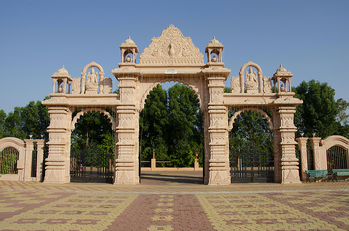 Carved Gateway at Nilkanthdham, Swaminarayan temple Poicha, Gujarat, India Carved Gateway at Nilkanthdham, Swaminarayan temple Poicha, Gujarat, India, by Zoonar RealityImages